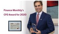 Commercial Bank’s Chief Financial Officer Rehan Khan holding his CFO Award for 2020 from Finance Monthly magazine. 