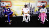 Winner AlphaTauri's French driver Pierre Gasly (C), second-placed McLaren's Spanish driver Carlos Sainz Jr (L), and third-placed Racing Point's Canadian driver Lance Stroll (R) attend a press conference after the Italian Formula One Grand Prix at the Auto