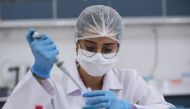 An official works at laboratory for antibody tests developed at Turklab firm on coronavirus (Covid-19) pandemic process in Izmir, Turkey on September 12, 2020. (Mahmut Serdar Alaku? - Anadolu Agency)
