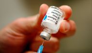 A nurse prepares an injection of the influenza vaccine at Massachusetts General Hospital in Boston, Massachusetts January 10, 2013. REUTERS/Brian Snyder/File Photo