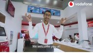 A Vodafone staff showing sign language.