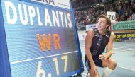 Armand Duplantis celebrates next to the board after he broke world pole vault record of 6.17 metres at the Orlen Copernicus Cup 2020 World Athletics Indoor meeting.