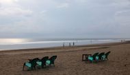 FILE PHOTO: Empty chairs are seen at Seminyak beach amid the spread of coronavirus disease (COVID-19) in Bali, Indonesia, March 23, 2020. REUTERS/Nyimas Laula/File Photo