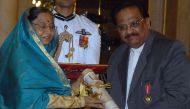 :(FILES) In this file photo taken on March 24, 2011 Indian President Pratibha Singh Patil (L) presents Indian singer S P Balasubrahmanyam during the presentation of the 'Padma Awards 2011' at the Presidential House in New Delhi. AFP / STR