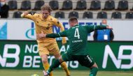Bodo/Glimt's Jens Petter Hauge in action with Kauno Zalgiris' Martynas Dapkus. Mats Torbergsen/NTB Scanpix/via REUTERS