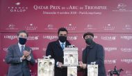 H E Sheikh Joaan bin Hamad bin Khalifa Al Thani presenting the Qatar Prix De l’Arc De Triomphe winner's trophy to the presentative of Sottsass, the new thoroughbred World Champion.