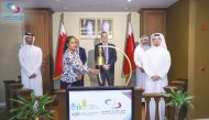Senior officials of Qatar Stock Exchange (QSE) and others at the bell ringing ceremony hosted as part of its participation in the World Investor Week initiated by IOSCO and the World Federation of Exchanges, at the QSE headquarters, yesterday. 