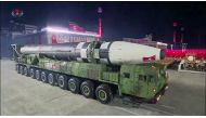 A screen grab taken from a KCNA broadcast on October 10, 2020 shows North Korean Hwasong-15 intercontinental ballistic missiles during a military parade marking the 75th anniversary of the founding of the Workers' Party of Korea, on Kim Il Sung square in 