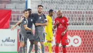 Al Wakrah players celebrate their victory next to dejected Al Afif of Al Duhail at the Al Duhail Stadium, yesterday.