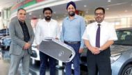 A provided picture of Point Junction Head of Operations (MENA), Harvinder Sahni and the KIA Qatar fleet sales team led by Mohammed Jassim and Mohammed Azmi, and others.