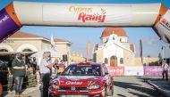 Qatar's Nasser Al Attiyah and co-driver Matthieu Baumel of France during the ceremonial flag off of the Cyprus Rally in Nicosia, Cypress, yesterday.

