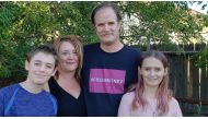 The Simis family, Atticus, Sarah, Arthur and Ophelia, pose for a photo in Gardnerville, Nevada, September 24, 2020. Simis family/Handout via Reuters. 