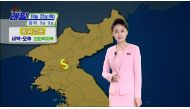 A weather caster of North Korea's state-run television KRT appears on screen in Pyongyang, North Korea October 21, 2020, in this still image taken from video. KRT/Reuters TV via REUTERS NORTH KOREA 