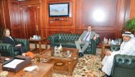 Ambassador of the United Kingdom in Doha, H E Jon Wilks, during a meeting with QIIB CEO, Dr. Abdulbasit Ahmad Al Shaibei, at the headquarters of the bank.