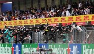 Mercedes' British driver Lewis Hamilton crosses the finish line to win the Portuguese Formula One Grand Prix at the Autodromo Internacional do Algarve on October 25, 2020 in Portimao. / AFP / POOL / JOSE SENA GOULAO