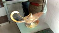 This handout photograph taken on October 29, 2020 and released by the Uttar Pradesh Police (UP Police) shows a lamp which was allegedly sold for $93,000 with the claim that it had magic powers as described in the popular folk tale 