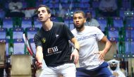 World No.1 Ali Farag (foreground) in action against England’s Richie Fallows during their second round match, yesterday. 