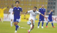 Al Sadd's Hashim Ali shoots to score against  Al Khor yesterday.