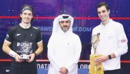 Champion Ali Farag and runner-up, New Zealand’s Paul Coll are seen with Tareq Zainal.