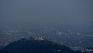 A general view shows the urban area of the Kathmandu Valley with Swayambhunath stupa from Ichangu Narayan village, on the outskirts of Kathmandu on November 9, 2020. AFP / Prakash Mathema 