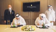 Senior officials of InterContinental Doha and Porsche Centre Doha during the signing ceremony. 