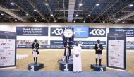 The podium winners of the Dressage - Medium (Level 1) event are seen during prize distribution ceremony at QEF's Indoor Arena yesterday.