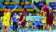 A Qatari player shoots at goal during the Asian Handball Championship match against China in Suwon, South Korea in this file photo.