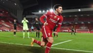 Soccer Football - Champions League - Group D - Liverpool v Ajax Amsterdam - Anfield, Liverpool, Britain - December 1, 2020 Liverpool's Curtis Jones celebrates scoring their first goal as Ajax's Andre Onana looks dejected Pool via REUTERS/Paul Ellis