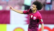 Qatar's Akram Afif celebrates after scoring his second goal against Bangladesh yesterday.