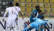 Action during the QNB Stars League Round 14 match between Al Gharafa and Al Arabi.