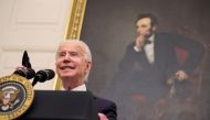With a portrait of former President Abraham Lincoln hanging in the background, U.S. President Joe Biden speaks about his administration's plans to fight the coronavirus disease (COVID-19) pandemic during a COVID-19 response event at the White House in Was