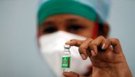 A nurse displays a vial of COVISHIELD, the AstraZeneca COVID-19 vaccine manufactured by Serum Institute of India, at a medical centre in Mumbai, India, January 16, 2021. REUTERS/Francis Mascarenhas/File Photo