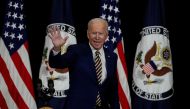 U.S. President Joe Biden waves after speaking to State Department staff during a visit by Biden at the State Department in Washington, U.S., February 4, 2021. REUTERS/Tom Brenner