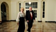FILE PHOTO: Former U.S. Secretary of State George Shultz arrives with his wife Charlotte for the state dinner hosted by U.S. President Barack Obama and first lady Michelle Obama for President of China Hu Jintao at the White House in Washington, January 19