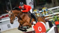 Kami Sabitov of Kyrgyzstan guiding Quintendro over a hurdle during 2020 Amir’s Sword Festival in this file photo. 