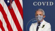 National Institute of Allergy and Infectious Diseases Director Dr. Anthony Fauci stands by during an event to commemorate the 50 millionth coronavirus disease (COVID-19) vaccination in the South Court Auditorium at the White House in Washington, U.S., Feb
