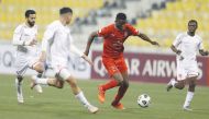 Al Duhail's Michael Olunga vies for the ball against Al Shamal players yesterday.