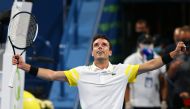 Roberto Bautista Agut of Spain celebrates hits victory against Russia's Andrey Rublev during their semi-final match of the Qatar ExxonMobil Open at the Khalifa International Tennis and Squash Complex in Doha yesterday.