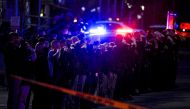 Law enforcement officers salute as emergency vehicles escort the body of slain police officer Eric Talley from the scene of a shooting at a King Soopers grocery store in Boulder, Colorado, U.S. March 22. 2021. Picture taken March 22, 2021. Michael Ciaglo/