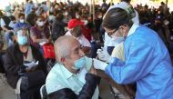 A man receives a dose of the Pfizer-BioNTech coronavirus disease (COVID-19) vaccine during a mass vaccination in Guadalajara, Mexico March 21, 2021. REUTERS/Henry Romero
