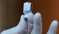 A health worker prepares a dose of the Pfizer-BioNTech coronavirus disease (COVID-19) vaccine during a mass vaccination in Guadalajara, Mexico March 21, 2021. REUTERS/Henry Romero
