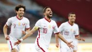 Qatar’s  Hassan Al Haydos (centre) celebrates after scoring their first goal against Azerbaijan at Nagyerdei Stadionin Debrecen, Hungary yesterday. 