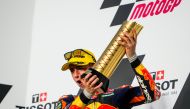 Spanish rider Pedro Acosta of Red Bull KTM Ajo celebrates on the podium after winning the Moto3 race of Tissot Grand Prix of Doha at Losail International Circuit yesterday.