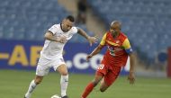 Al Sadd's Guilherme vies for the ball possession against a Foolad player during their opening Group C match yesterday. PIC: AL SADD