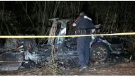 The remains of a Tesla vehicle are seen after it crashed in The Woodlands, Texas, April 17, 2021, in this still image from video obtained via social media. Video taken April 17, 2021. SCOTT J. ENGLE via REUTERS 