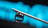 FILE PHOTO: World Health Organization logo is reflected in a drop on a syringe needle in this illustration photo taken March 16, 2021. REUTERS/Dado Ruvic/Illustration/File Photo

