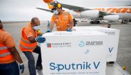 FILE PHOTO: Workers take care of the shipment of Russia's Sputnik V vaccine against the coronavirus disease (COVID-19) at the airport, in Caracas, Venezuela March 29, 2021. REUTERS/Manaure Quintero