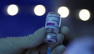 A doctor prepares a dose of AstraZeneca's Covid-19 vaccine in his general practice facility, as the spread of the coronavirus disease (COVID-19) continues, in Vienna, Austria May13, 2021. Reuters/Leonhard Foeger
