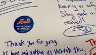 A note of gratitude is written on a wall inside a Covid-19 vaccine site attached to New York Mets stadium Citi Field in Queens, New York, U.S., May 24, 2021. Picture taken May 24, 2021. Reuters/Amy Tennery