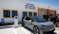 A Volkswagen ID.4 electric car is charged at the premises of the airport on the island of Astypalea, Greece, June 2, 2021. Alexandros Vlachos/Pool via REUTERS

